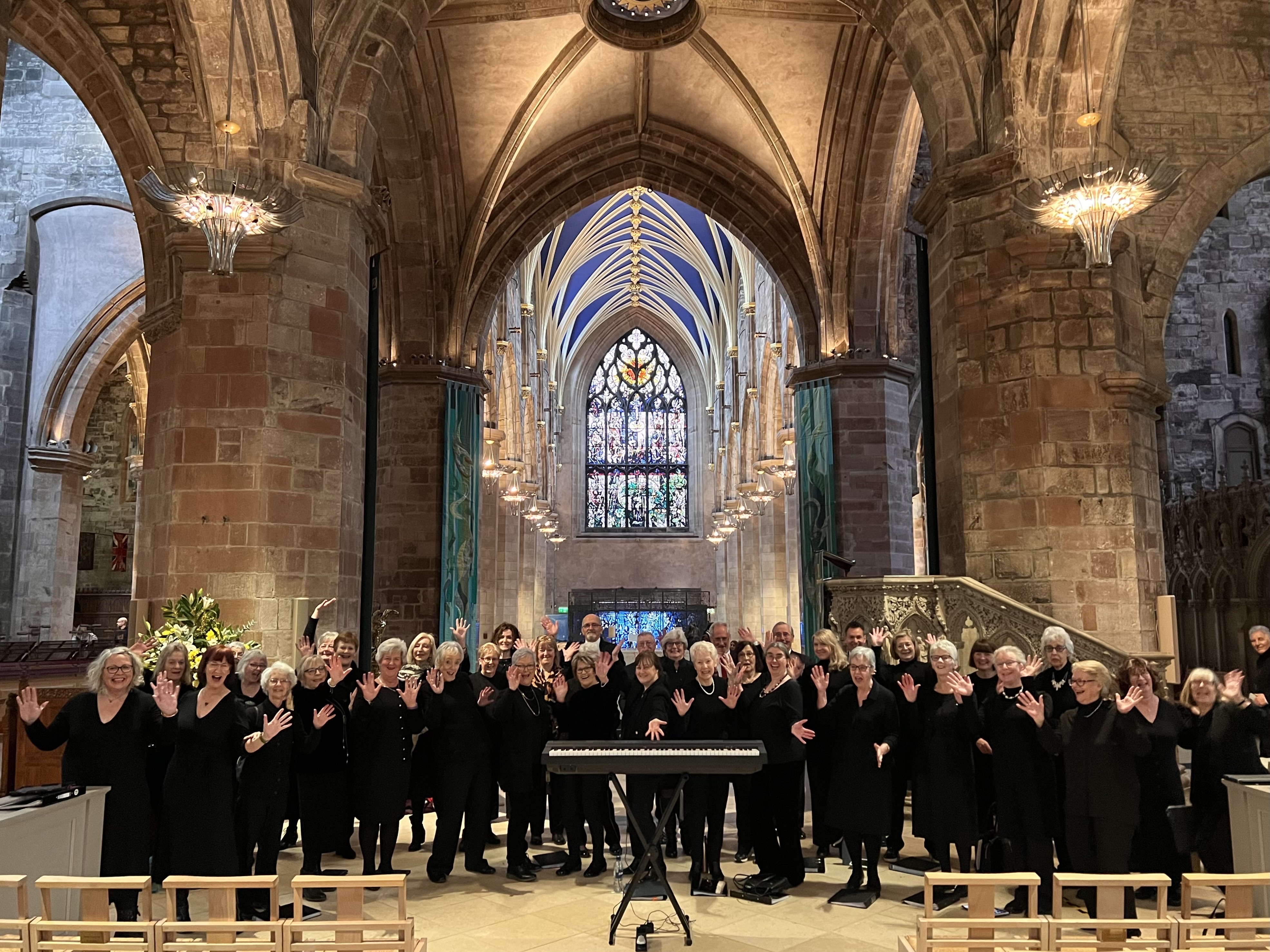 Newmarket Community Choir performing in a cathedral